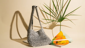 alt="upcycled purse made of aluminum - escama studio"