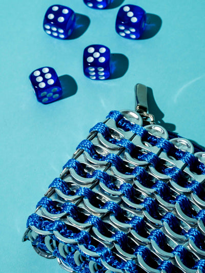 alt="chainmail dice bag made from soda pop tabs - blue dice pouch escama studio"