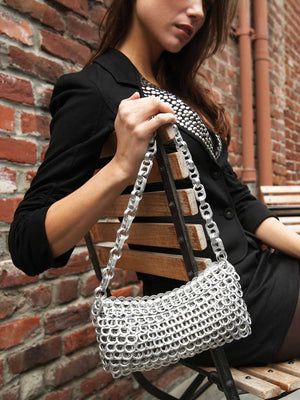alt="chain strap purse - soda tab purse escama studio"