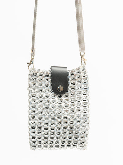 alt="silver crossbody phone bag made of upcycled pop tabs with leather fold over flap and snap closure - escama studio"