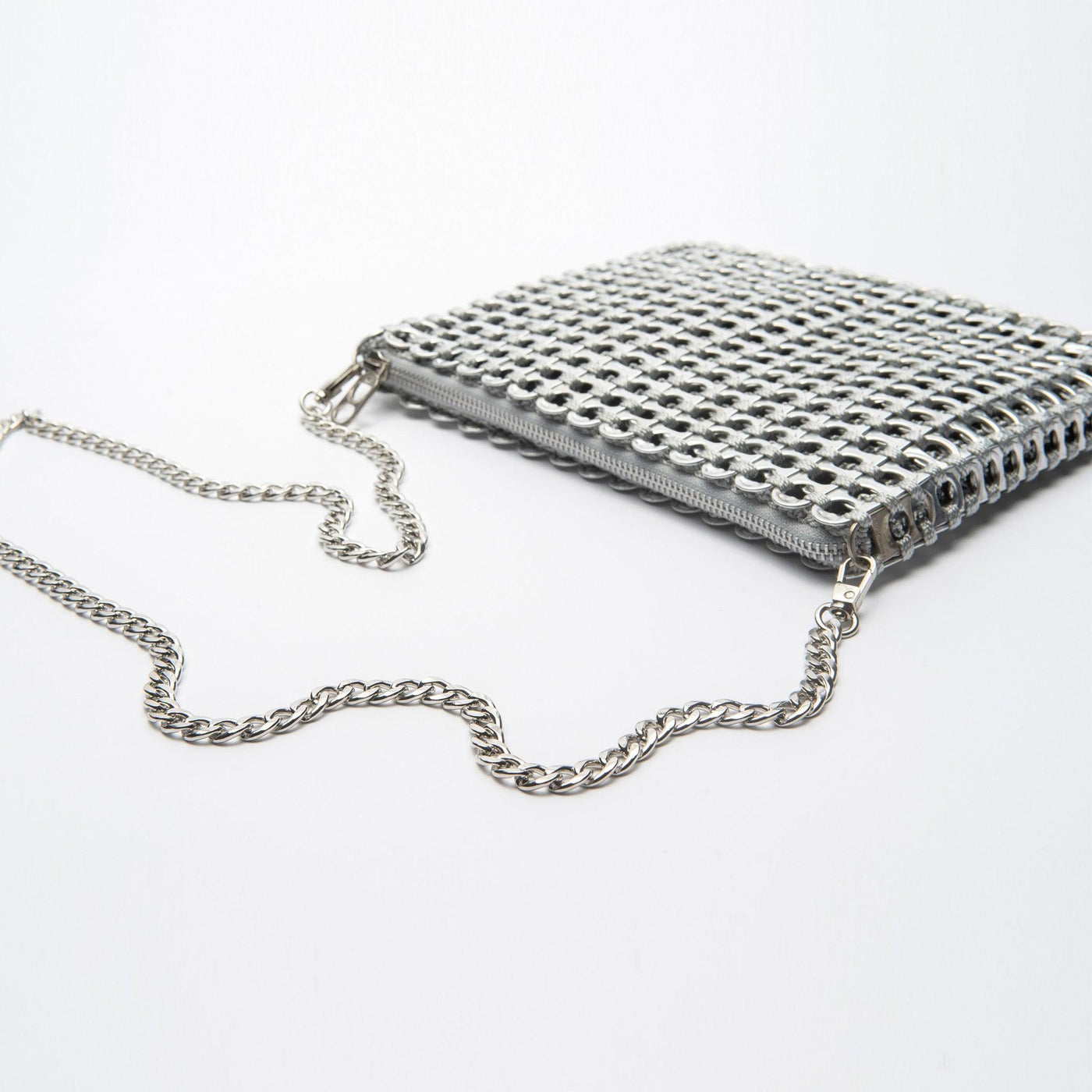 alt="upcycled crossbody bag with chain strap - escama studio"