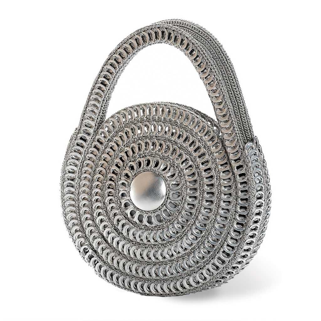 alt="silver metallic circle purse made of recycled aluminum pop tabs - Escama Studio"