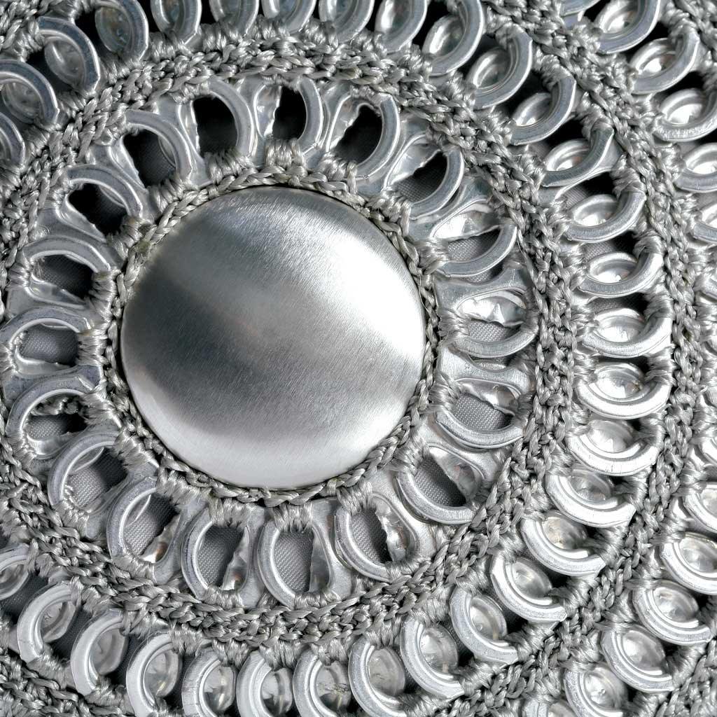 alt="close up of spiral purse made of recycled aluminum soda pop tabs - escama studio"