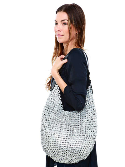 alt="silver hobo purse with leather strap - ring pull purse escama studio"