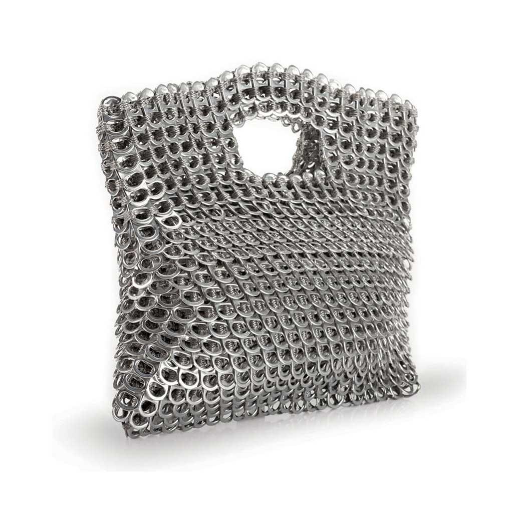 alt="silver clutch with cut out handle, winner of instyle magazine best green handbag - escama studio"