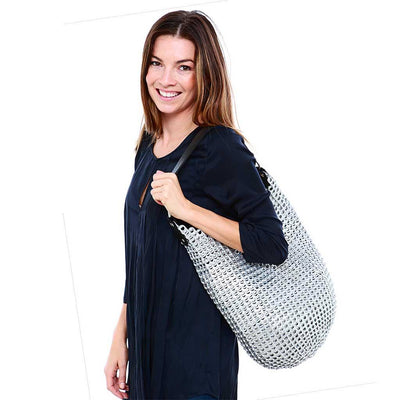 alt="silver woven boho bag made with recycled soda tabs - escama studio"